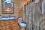 The Great Escape - Full bath tub/shower combo in basement 